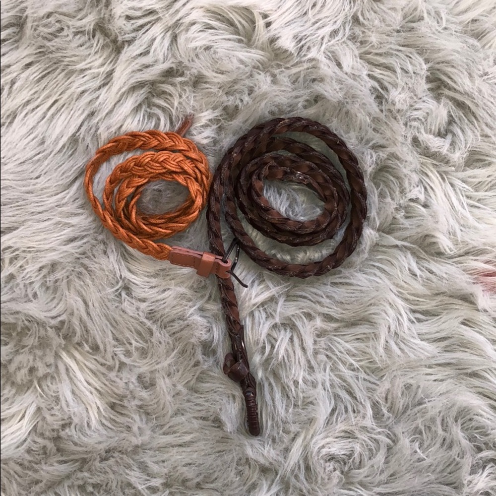 Two brown braided belts